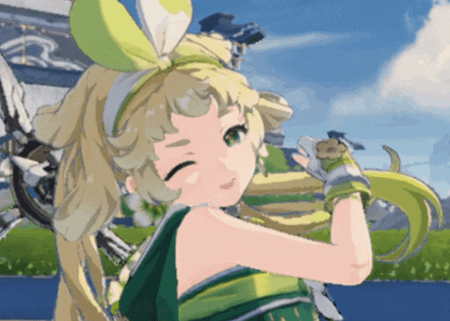 a girl with yellow hair and green gloves is smiling and wearing a green dress