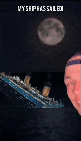 a man is smiling in front of a picture of a titanic ship