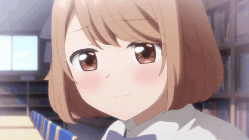 a close up of a girl with brown hair