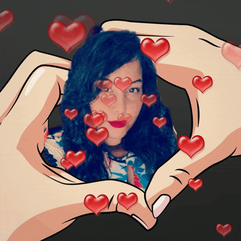 a woman 's face is surrounded by red hearts