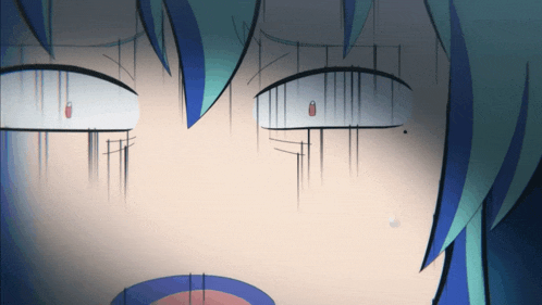 a close up of a person 's face with a tear coming out of it