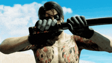 a man with a tattoo on his arm holding a sword