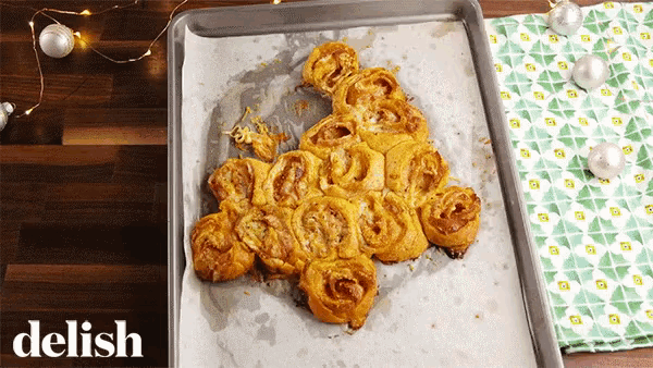 a tray of food with the word delish written on it