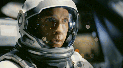 a man in a space suit with a helmet on