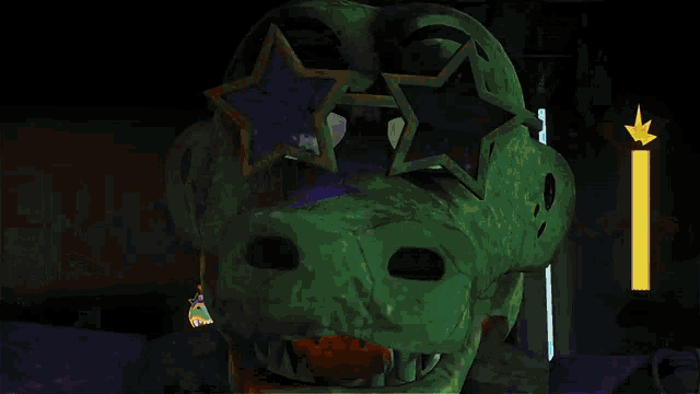 a blurry image of a green and orange object
