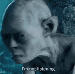 a close up of a person 's face with a caption that says i 'm not listening