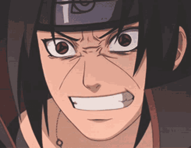 a close up of a person 's face with the letter t on his headband