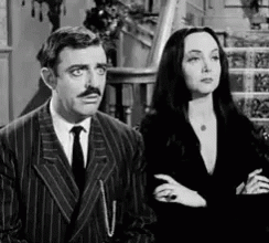 Not Impressed Addams Family GIF - Not Impressed Addams Family Confused GIFs