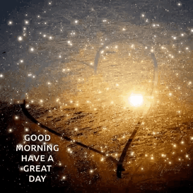 a good morning have a great day greeting card with the sun shining through a heart shaped window