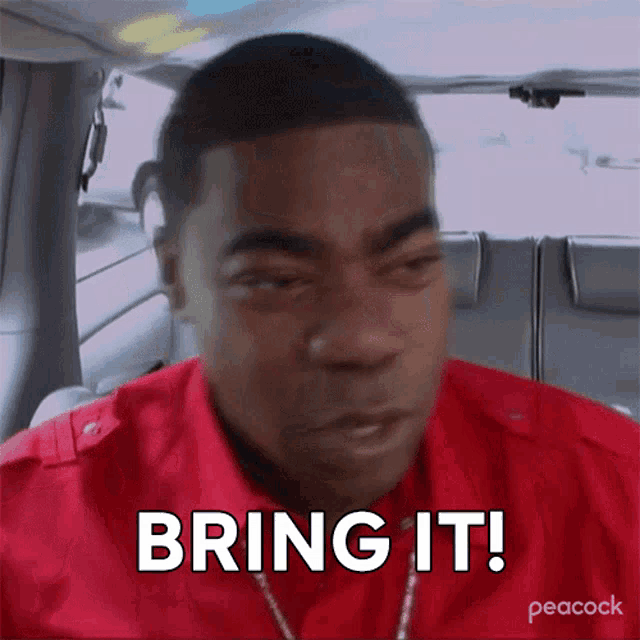 a man in a car says bring it