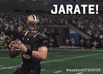 a saints football player is running on a field with the word jarate above him