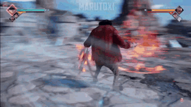 a man in a red jacket is playing a video game with the name marutoxi on the screen .