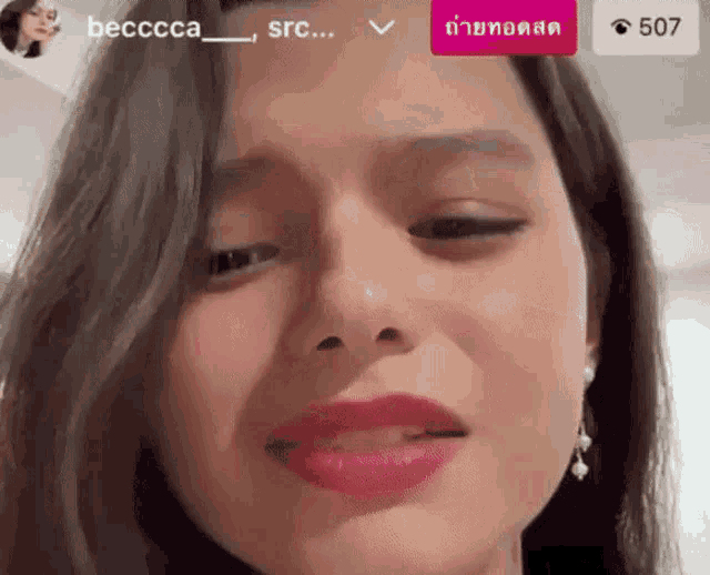 a close up of a woman 's face with the name becccca on the bottom