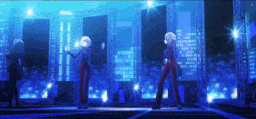 a couple of anime characters standing on a stage with a city in the background