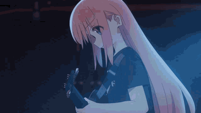 a girl with pink hair is holding a guitar