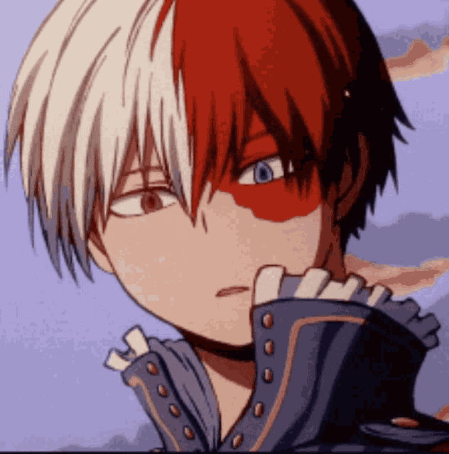 a close up of a cartoon character with red and white hair