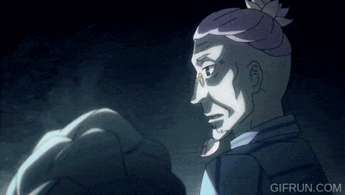 a gif from gifrun.com shows a man with glasses and purple hair
