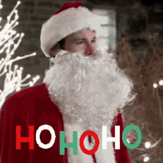 a man dressed as santa claus with the word ho ho ho written on the bottom