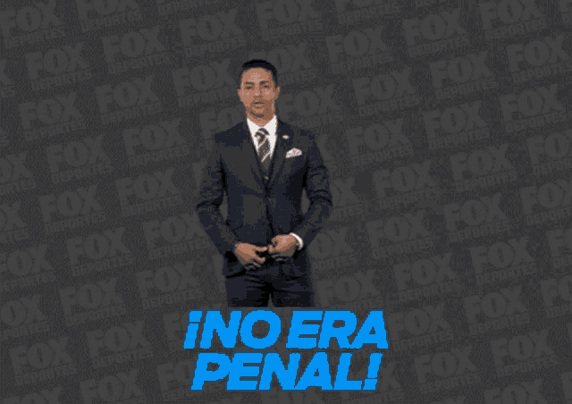a man in a suit and tie stands in front of a fox advertisement