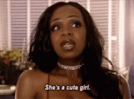 a woman is saying she 's a cute girl .