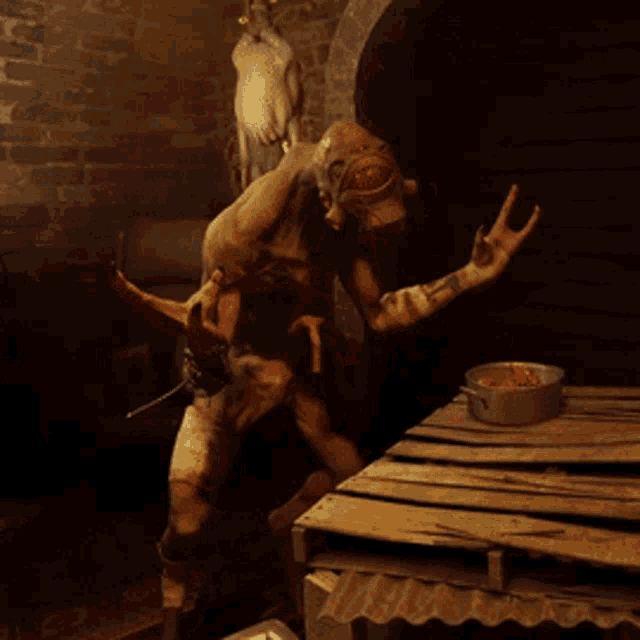 a monster is standing in a dark room with a pot of food
