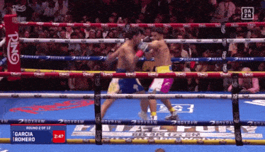a boxing match between garcia and romero is shown