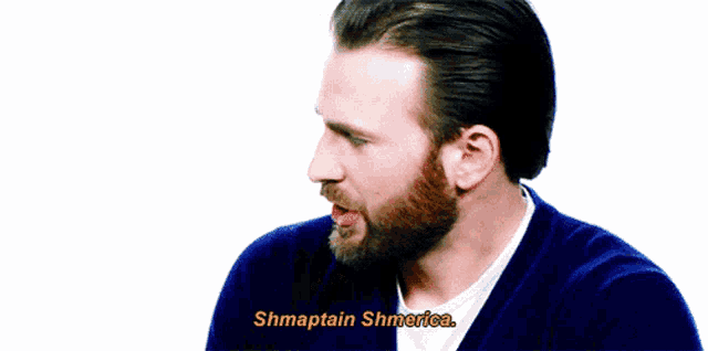 a man with a beard says shmaptain shmerica in yellow letters