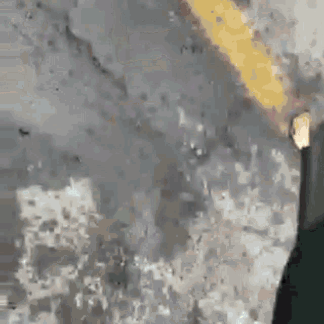 a close up of a person 's face with a blurred background