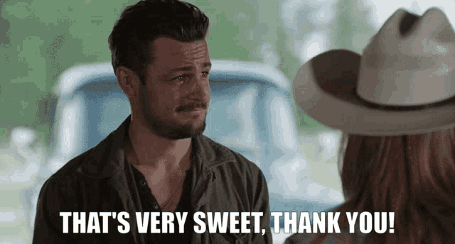 a man in a cowboy hat says " that 's very sweet thank you ! "