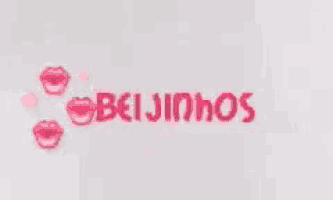the word beijinhos is written in red letters on a white surface .