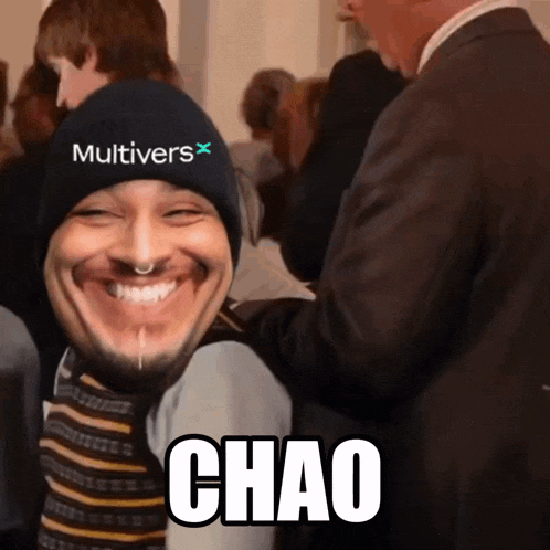a man wearing a beanie with multivers on it