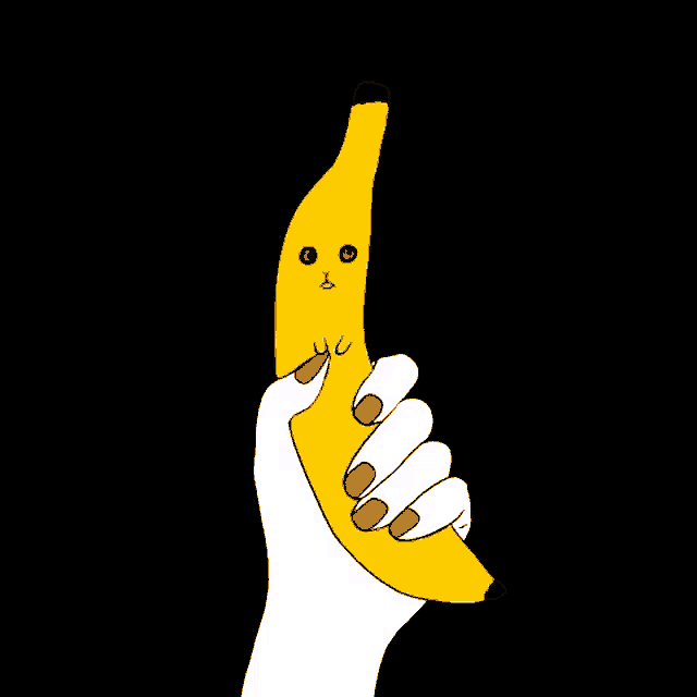 a woman 's hand with red nails is holding a banana with a face on it