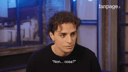 a man in a black sweater says non cosa
