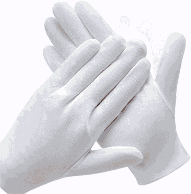 a white chef 's jacket with black cuffs and buttons on a white background .