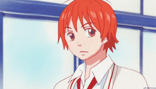 a cartoon of a boy with red hair and a white shirt with a red tie