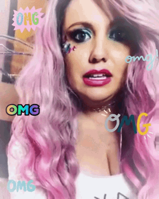 a woman with pink hair is surrounded by omg stickers on her face