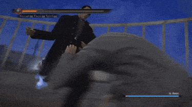 a video game screen shows a man laying in a hospital bed being attacked