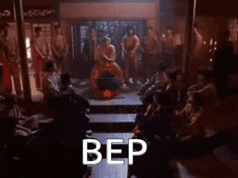 a group of people are gathered around a man sitting in a chair with the word bep written on it