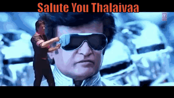 a picture of a man wearing sunglasses with the words salute you thalaivaa