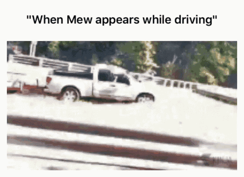 a white truck is driving down a road and says " when mew appears while driving " on the bottom