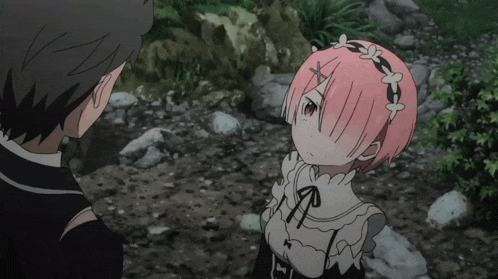 a boy and a girl are standing next to each other