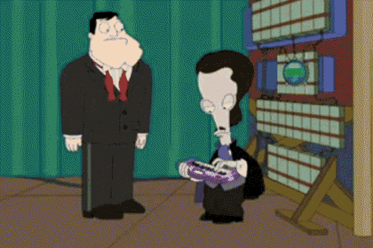 a man in a suit and tie stands next to another man