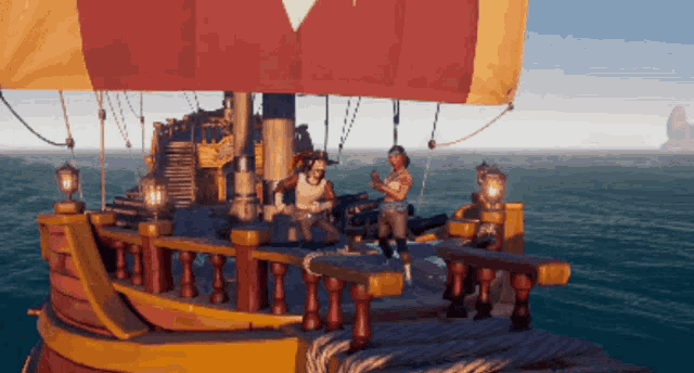 a pirate ship with a red and yellow sail is in the ocean