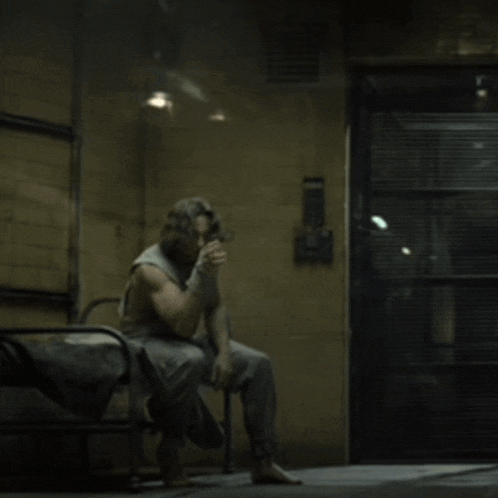 a ghostly figure is flying through a doorway in a dark room
