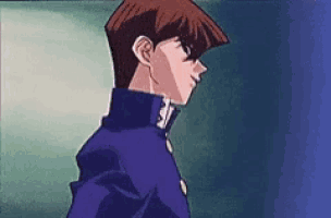 a man in a blue jacket is standing in front of a blue wall in a cartoon .