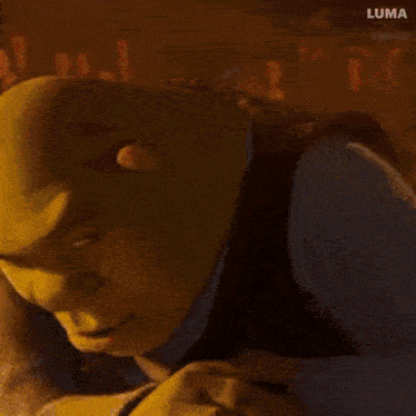 a close up of shrek 's face with luma in the corner
