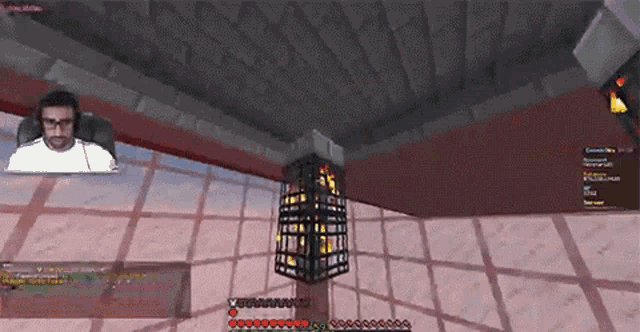 a man is sitting in a chair in a video game with a lantern in the background