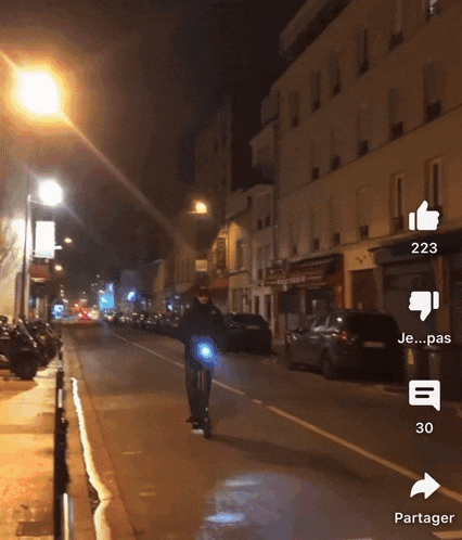 a person riding a scooter down a street with a thumbs up and a dislike button
