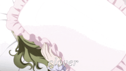 a close up of a girl with the word clover on the bottom