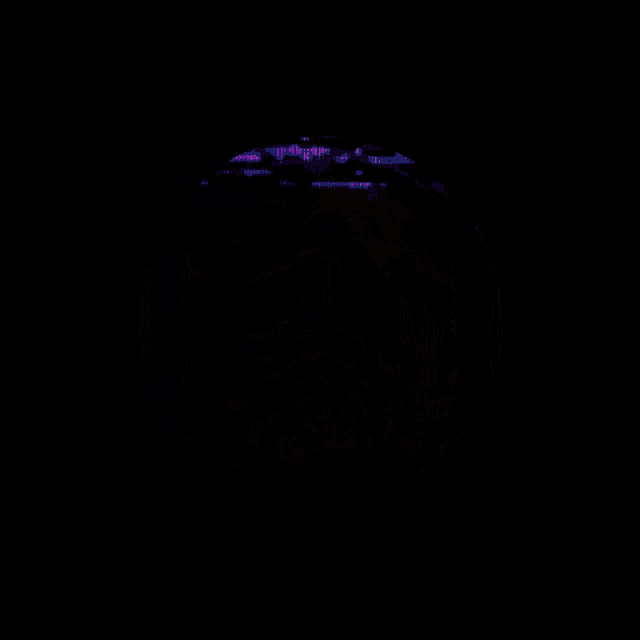 a yellow circle on a black background with a swirl design